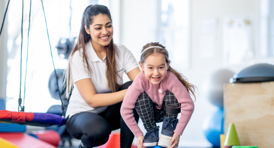 Occupational therapist working with a child