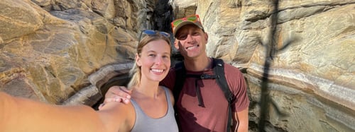 Couple taking a selfie together while hiking