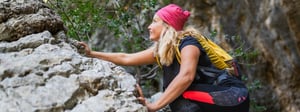 Woman rock climbing