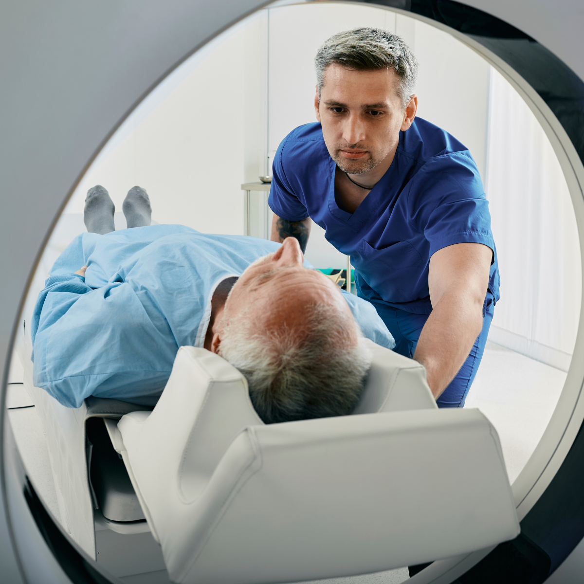 CT tech scanning a patient