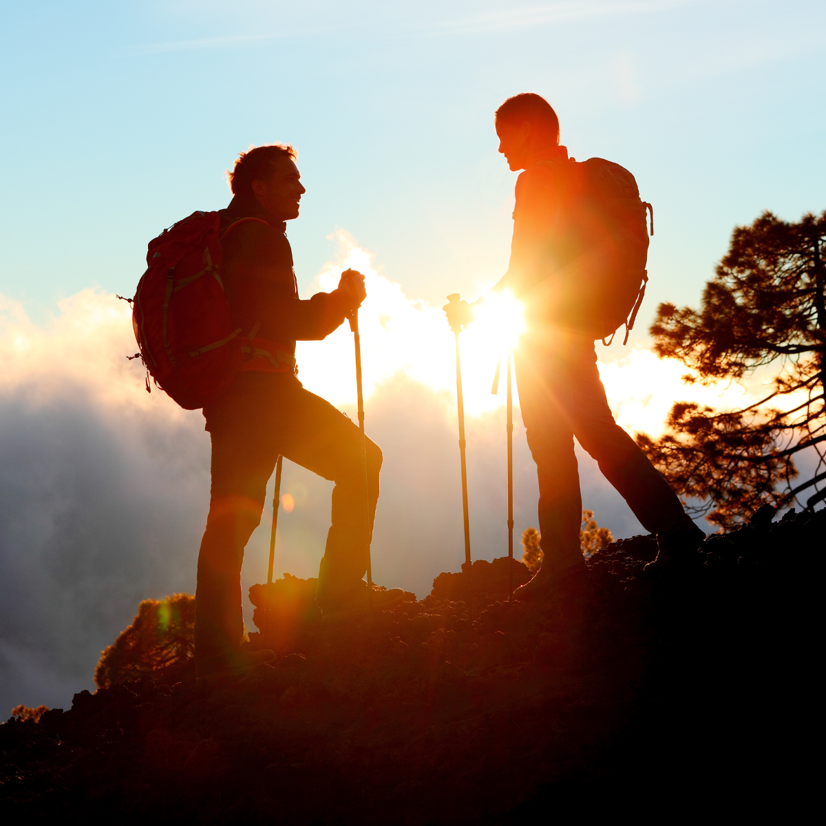 Couple hiking on rocky terrain