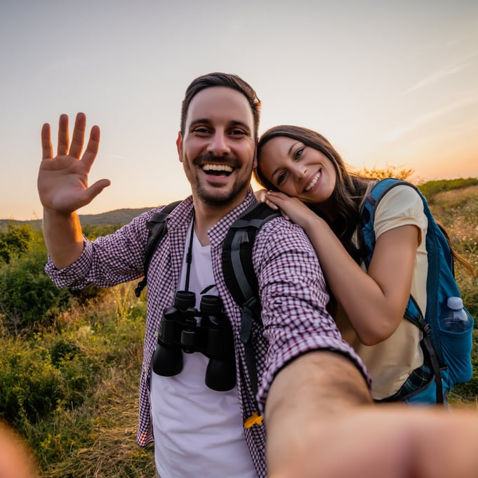 Couple smiling and taking a selfie