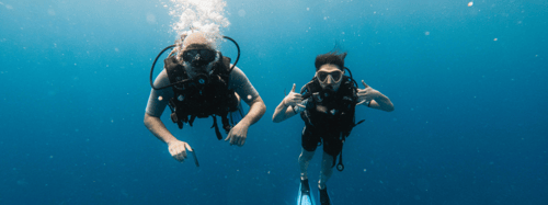 Two men scuba diving in the ocean