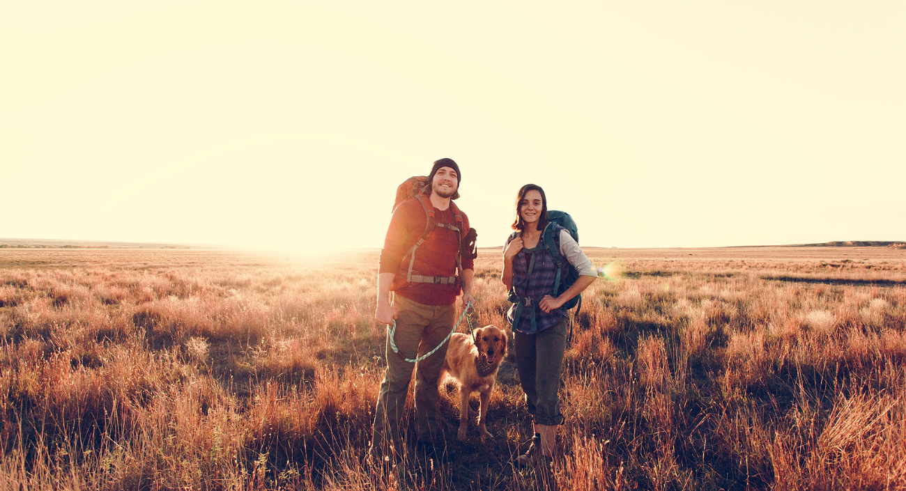 allied health travel couple with their dog