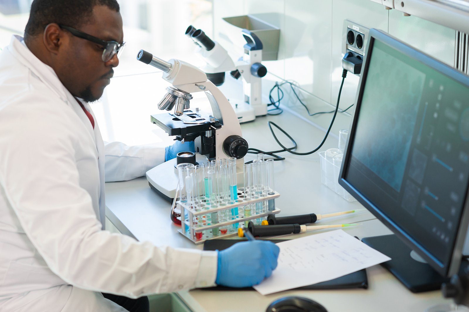 bigstock-African-american-Man-Working-I-399840854