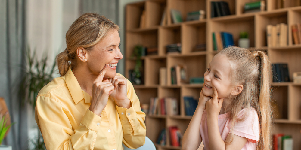 Speech language pathologist working with a student-1